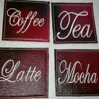 Exquisite Embroidery: Set of Four Leather Coasters