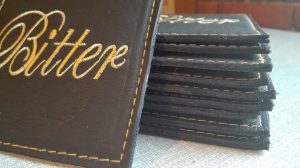 bitter leather drinks mats